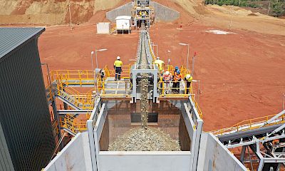 First mineralized material to surge bin from the crusher - April 2023